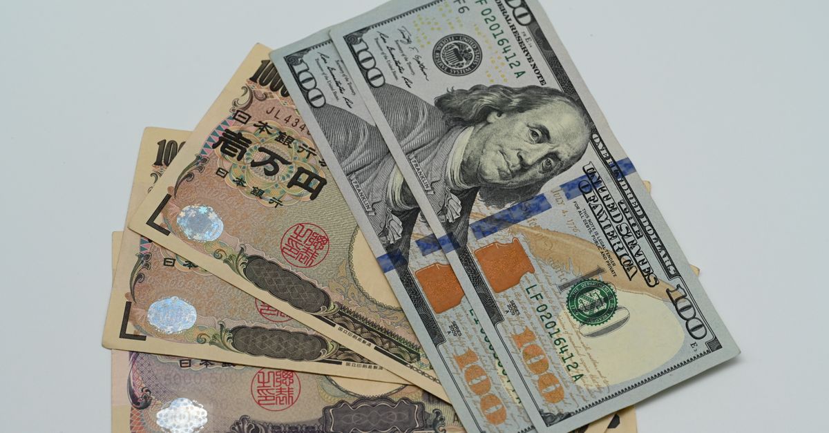 Close-up image of US dollars and Japanese yen notes, representing currency exchange concept.