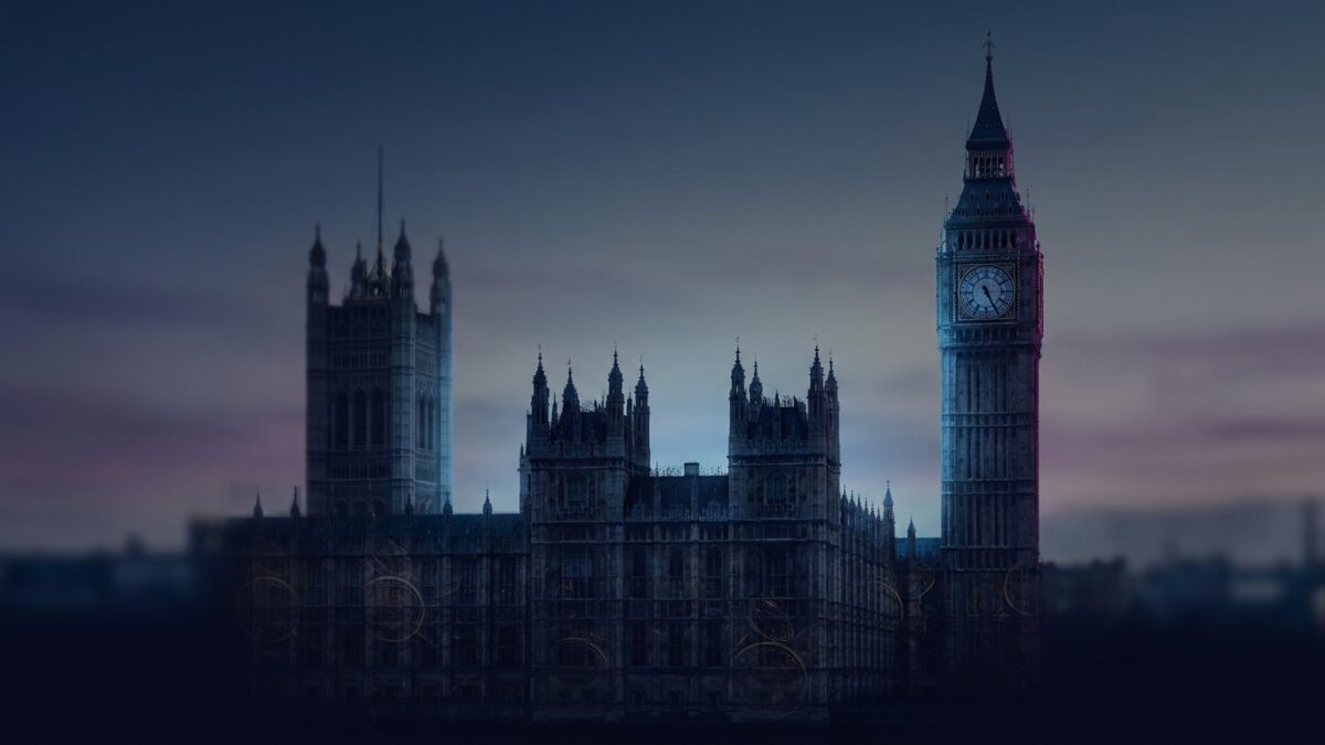 Ilustración: the Houses of Parliament silhouetted against a dusk sky. Ilustración generada con IA.