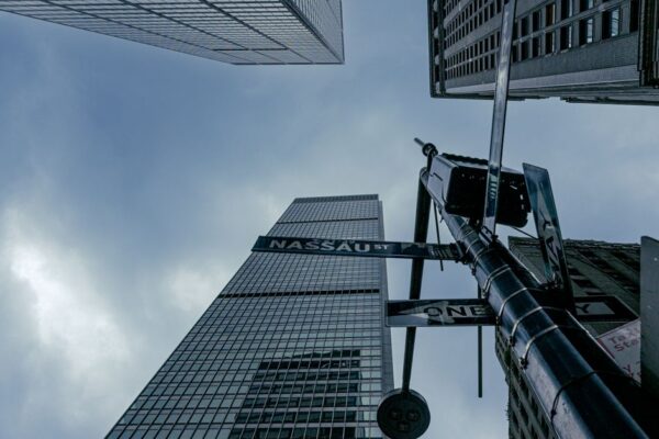 View of skyscrapers from street level at Nassau Street, New York City.