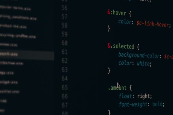 Close-up of colorful CSS code lines on a computer screen for web development.